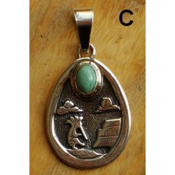 Médaillon navajo en argent et turquoise représentant Kokopelli